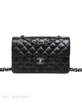 CHANEL Black Quilted Shoulder Bag with Silver-Tone CC Lock